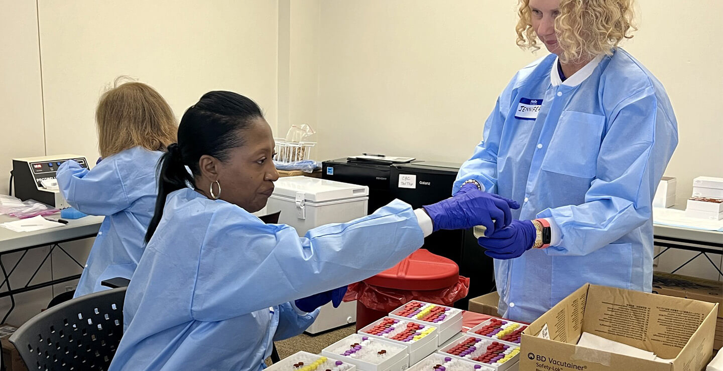 Pennington Biomedical researchers organizing collected samples